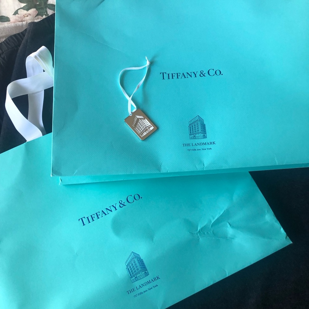 Tiffany & Co. Two large shopping bags and Landmark charm